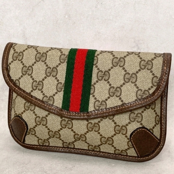 Gucci Handbags - Gucci Beige Monogram Sheri Lane Pouch with Red and Green Accent